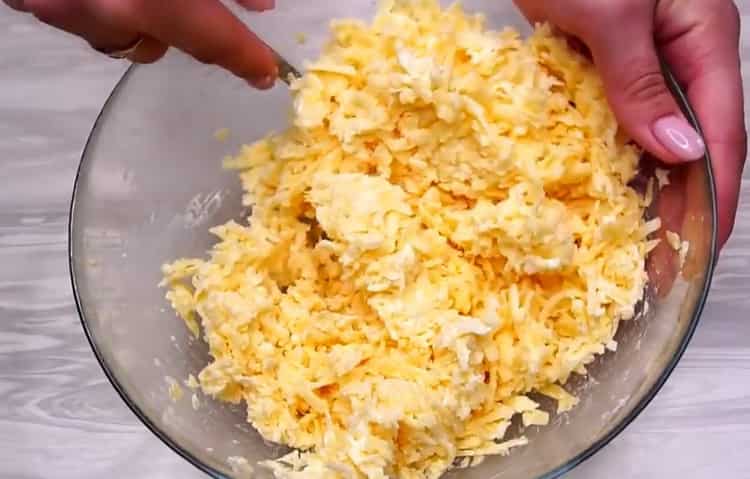 За да направите питки със сирене във фурната, пригответе пълнежа