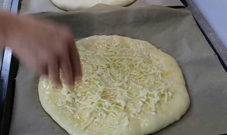 Хачапури със сирене във фурната според стъпка по стъпка рецепта със снимка